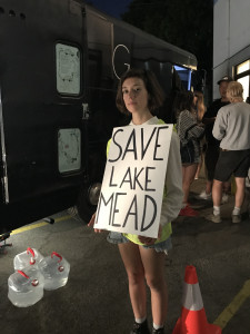 Holding sign Save Lake Mead.
