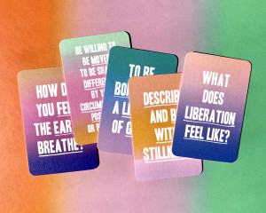 multicolored cards. top card text says What does liberation feel like?