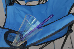 drink cup and straw in blue camp chair, drink holder