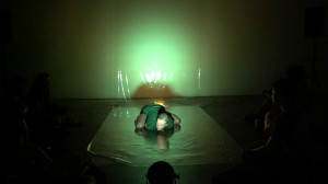 performance art in green light