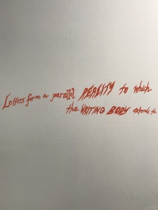art installation: red text on wall